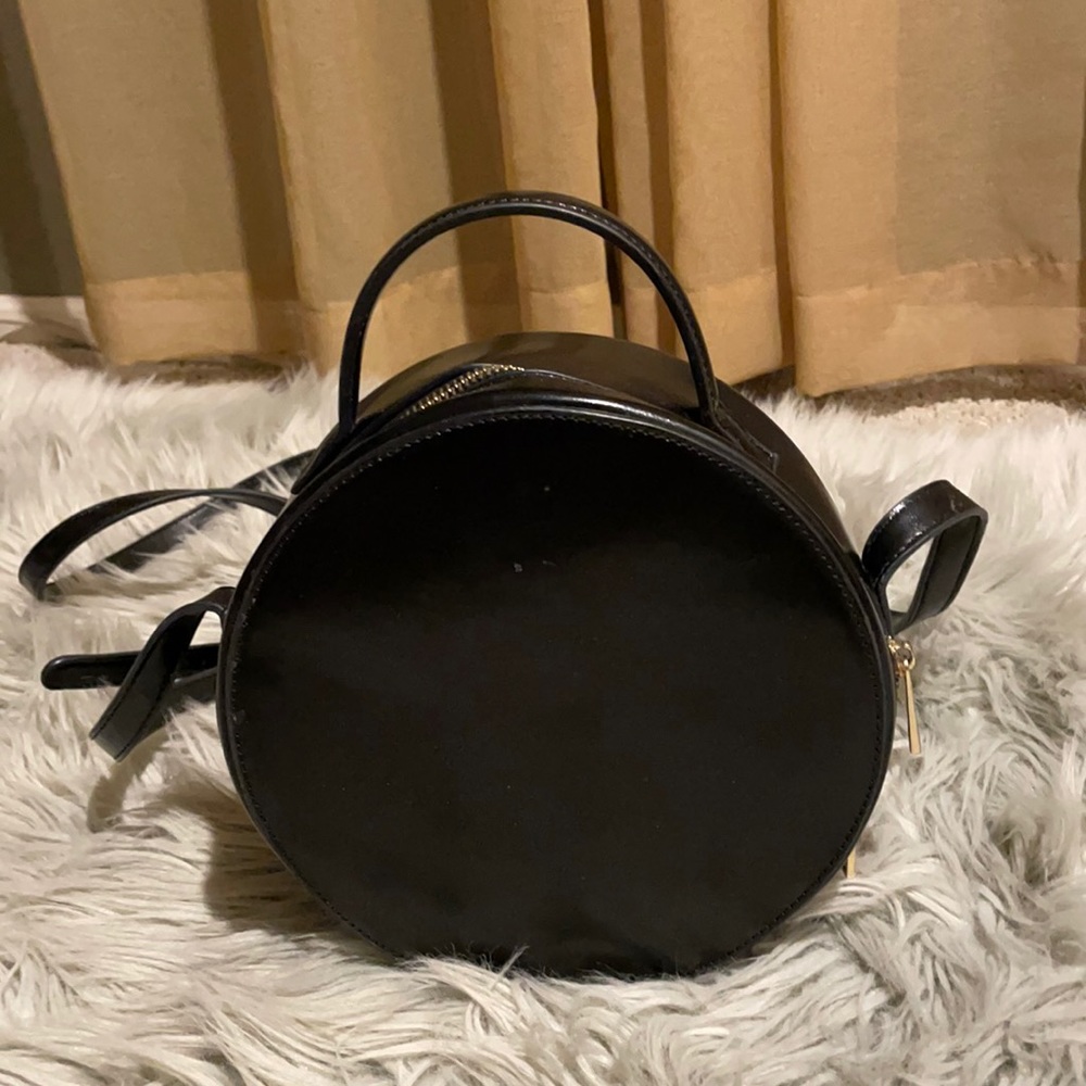 Round smaller cute black purse from Forever 21